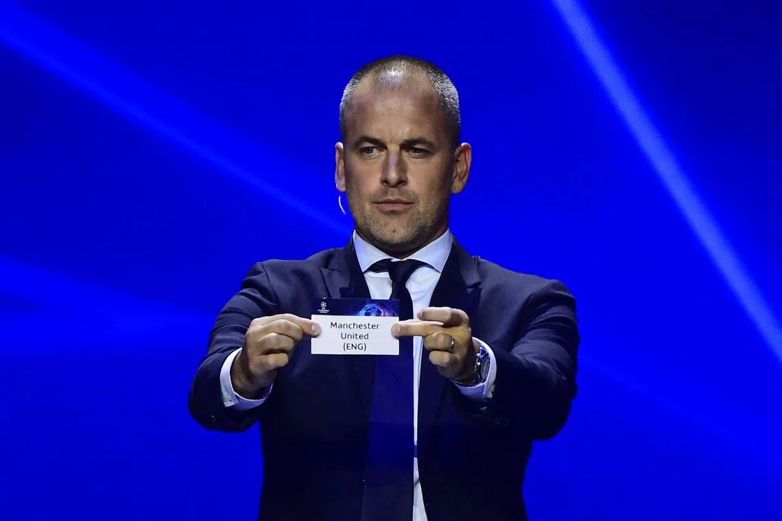 Former Chelsea player Joe Cole draws Manchester United during the Champions League draw.