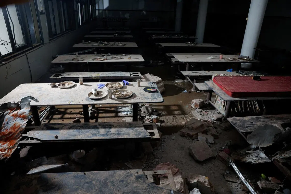 FILE PHOTO: Debris lies in a medical college hostel canteen after an Air India aircraft, bound for London's Gatwick Airport, crashed there after taking off from an airport in Ahmedabad, India June 12, 2025. REUTERS/Adnan Abidi/File Photo