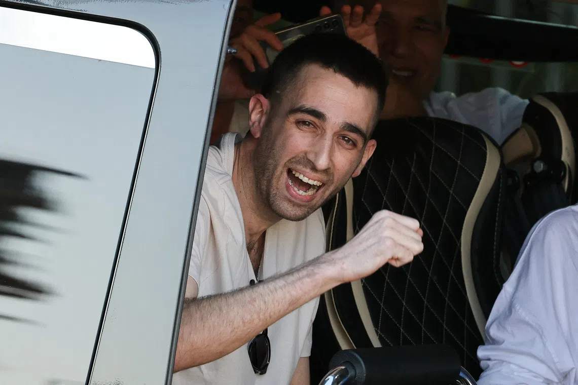 Released hostage Avinatan Or, who was kidnapped during the deadly October 7, 2023 attack by Hamas and taken to Gaza, reacts upon arrival at the site of Rabin Medical Center-Beilinson Hospital, amid a hostages-prisoners swap and a ceasefire deal between Israel and Hamas in Gaza, in Petah Tikva, Israel October 13, 2025. REUTERS/Stoyan Nenov