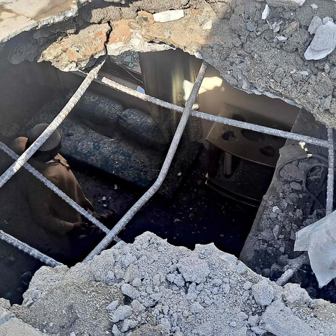 A resident looks at the remains of his house damaged by cross-border shelling at Khyber district, near the frontier province of Khyber Pakhtunkhwa.