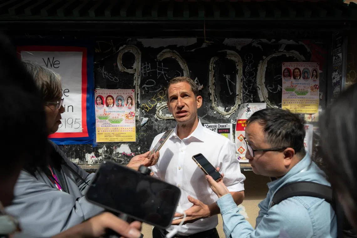 FILE — Daniel Lurie, the wealthy philanthropist and heir to Levi Strauss who was elected Mayor of San Francisco in Nov. of 2024, talks with reporters in the city, June 19, 2024. The new mayor’s rise has inspired optimism in a city desperate for change, but also questions about whether a political neophyte, worth hundreds of millions of dollars, can run San Francisco, and concerns about the reality that institutions all over the region are arguably beholden to his family. (Mike Kai Chen/The New York Times)