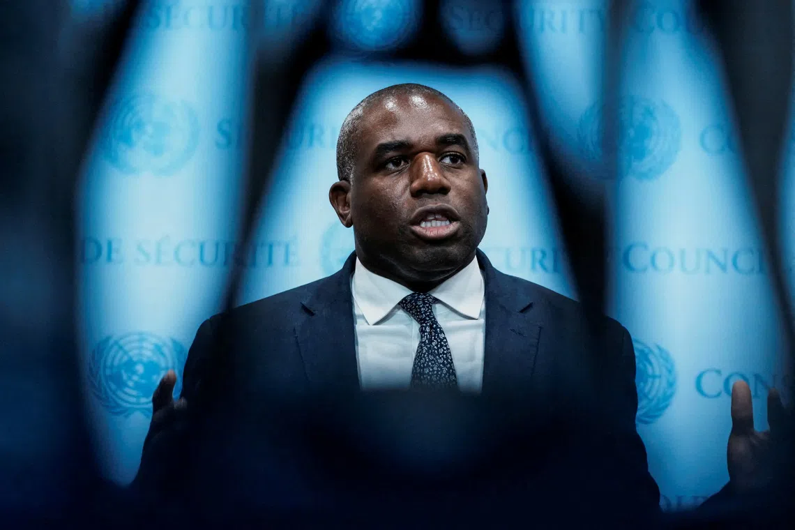 FILE PHOTO: Britain's Foreign Secretary David Lammy speaks during a stakeout after addressing during a High-level International Conference for the Peaceful Settlement of the Question of Palestine and the Implementation of the Two-State Solution at U.N headquarters in New York City, U.S., July 29, 2025.  REUTERS/Eduardo Munoz/File photo