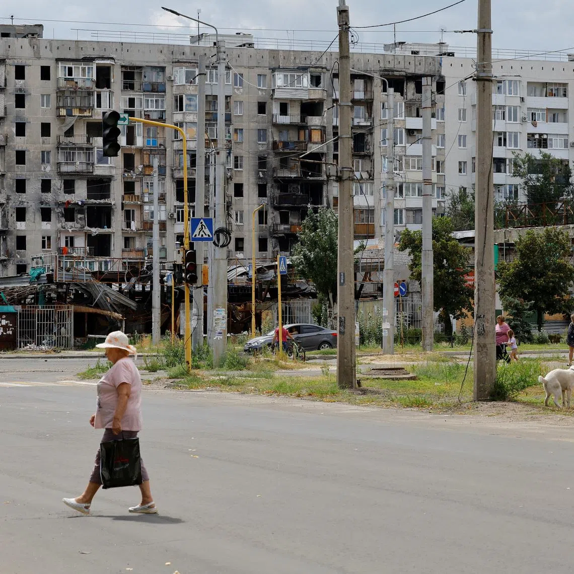 A view shows a multi-storey residential building damaged in the course of Russia-Ukraine conflict in the town of Severodonetsk in the Luhansk region, Russian-controlled Ukraine August 8, 2024. REUTERS/Alexander Ermochenko