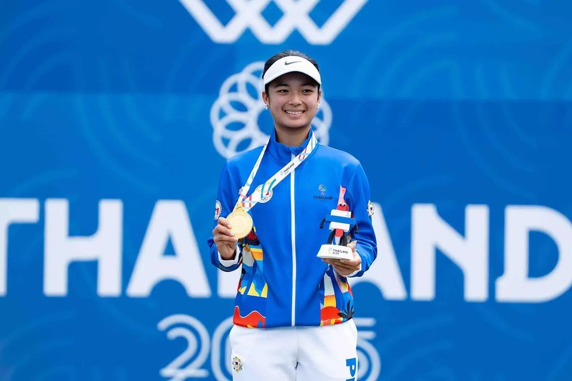 Filipina tennis player Alexandra Eala posing with her SEA Games women's singles medal on Dec 18, 2025.