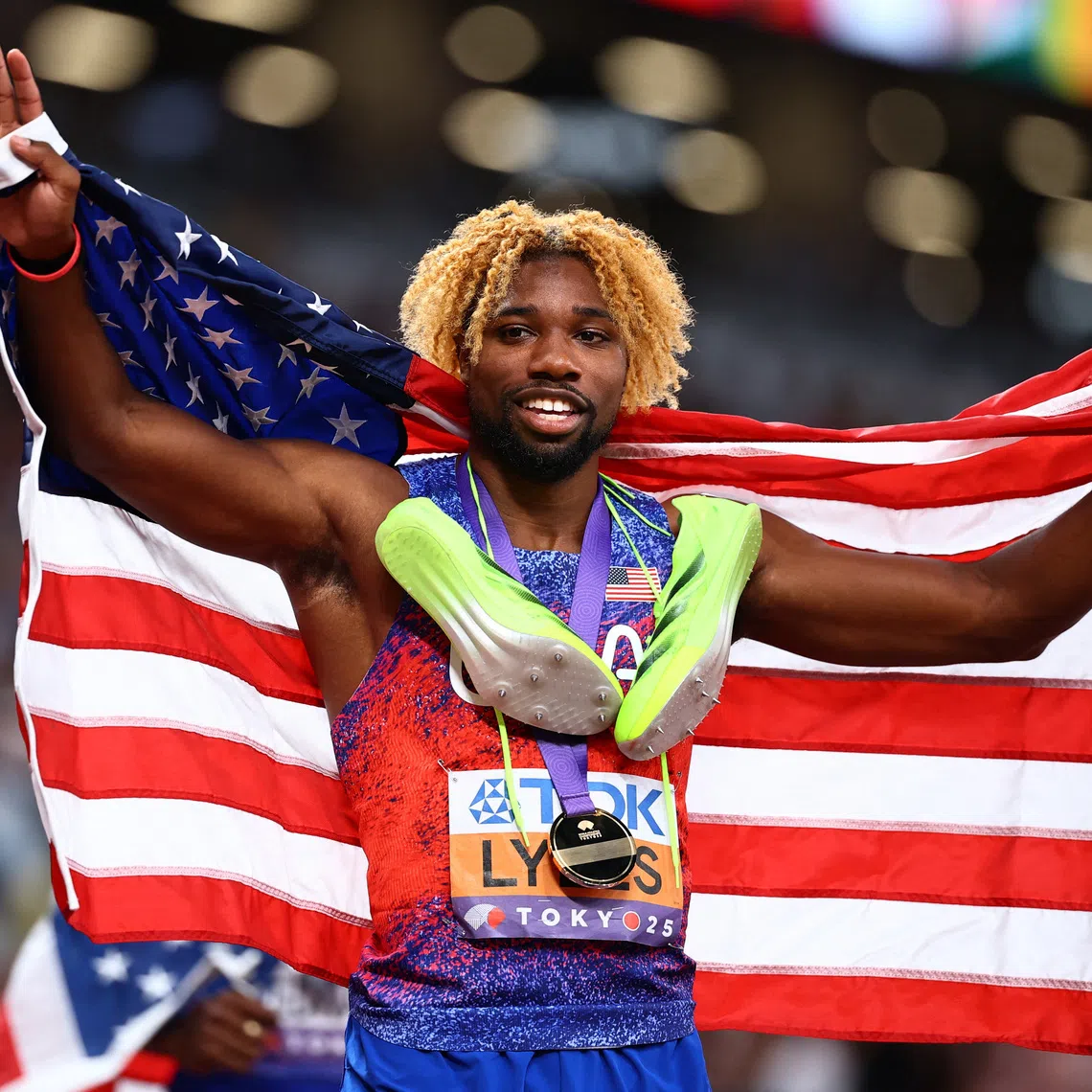 World Athletics Championships Tokyo 2025 - Men's 200m Final - Japan National Stadium, Tokyo, Japan - September 19, 2025 Noah Lyles of the U.S. celebrates after winning the gold medal REUTERS/Sarah Meyssonnier