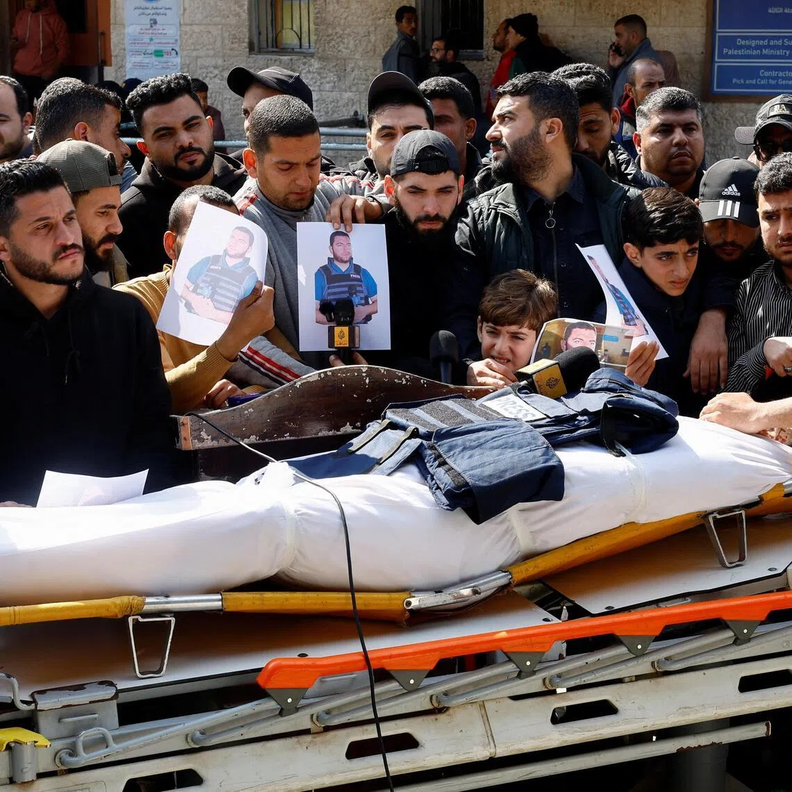 Mourners attend the funeral of Al Jazeera journalist Ahmed Wishah, who was killed in an Israeli strike on June 17, 2026.
