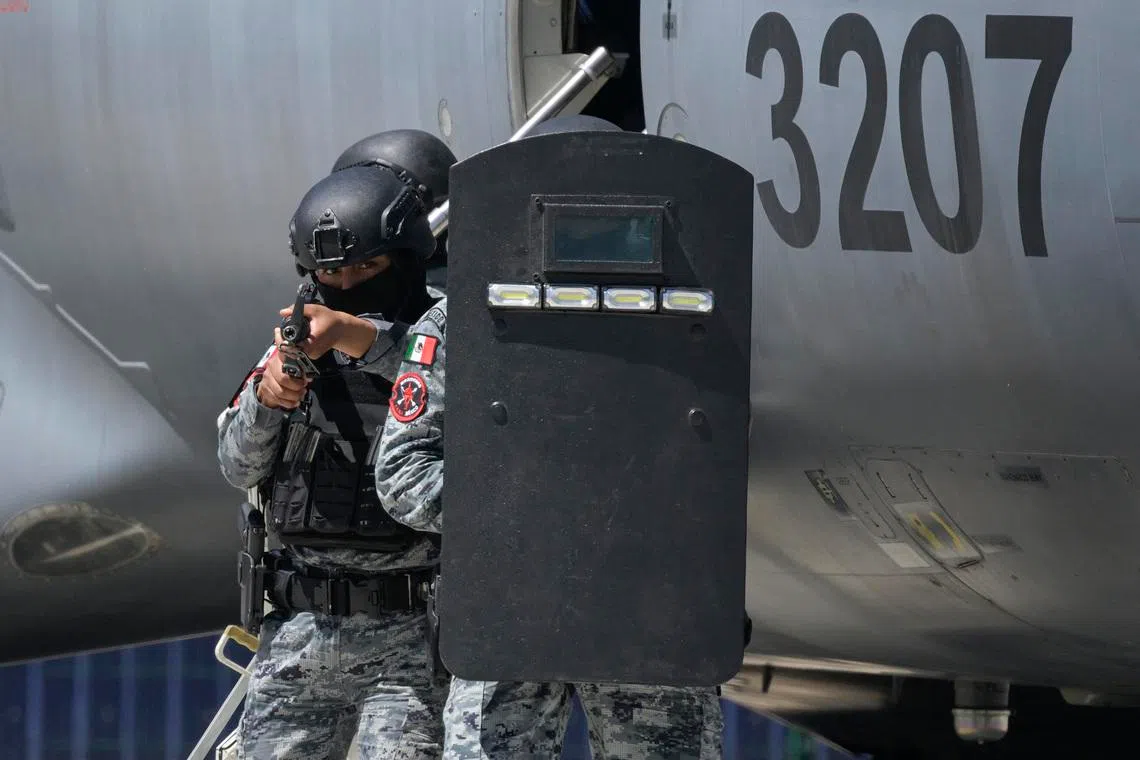 Agents of the National Guard participating in an aircraft-hijacking drill as part of ‘Exercise Ollamani’ at the Santa Lucia Military Base, in the municipality of Zumpango, State of Mexico, Mexico, on March 19, 2026. 