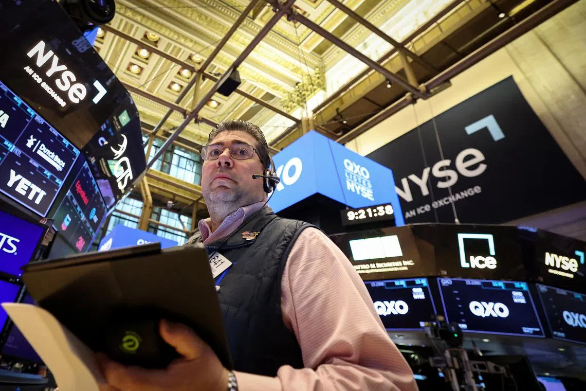 A trader working on the floor of the New York Stock Exchange, in New York City, on April 30.