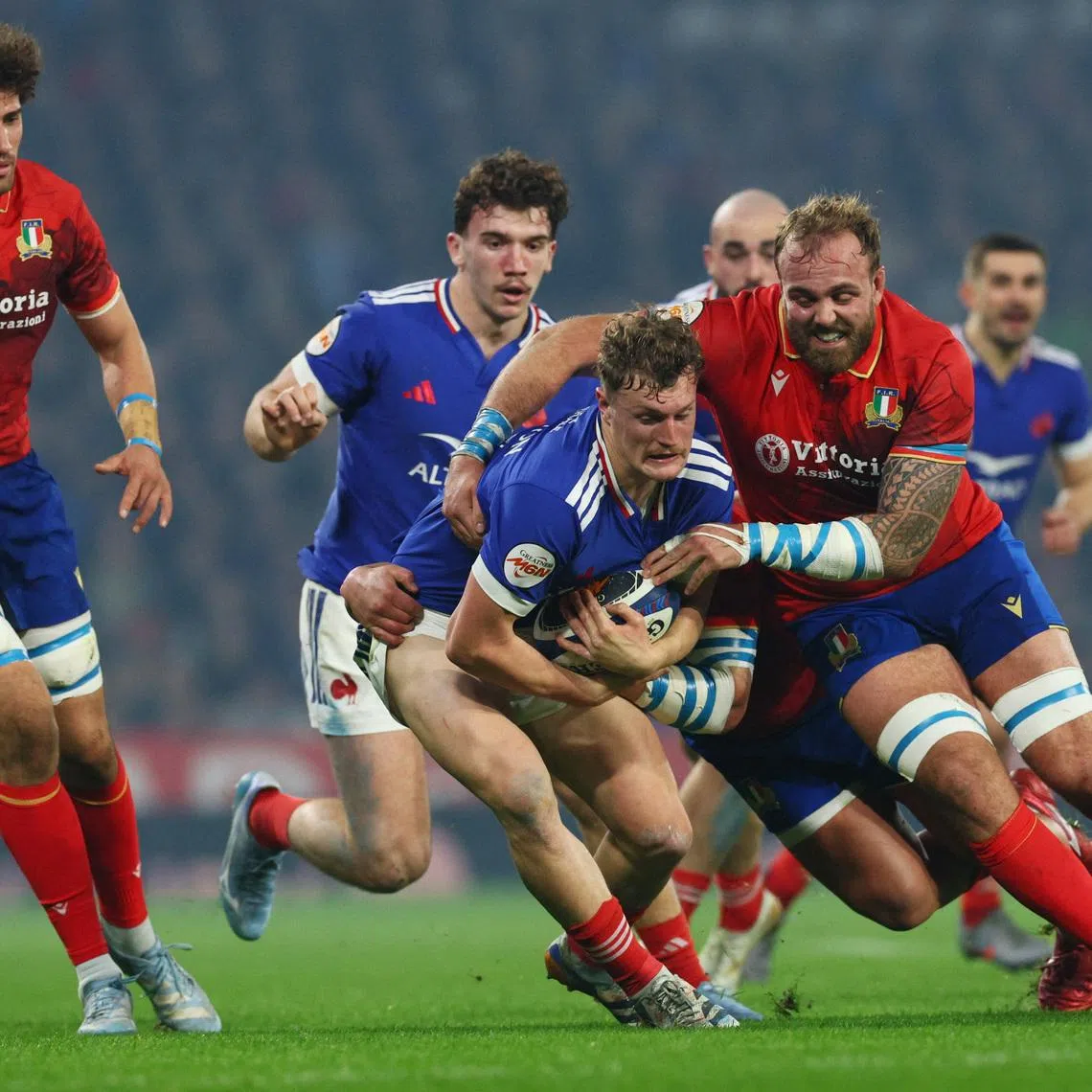 Rugby Union - Six Nations Championship - France v Italy - Stade Pierre-Mauroy, Villeneuve-d'Ascq, France - February 22, 2026 France's Thibaud Flament in action with Italy's Niccolo Cannone REUTERS/Manon Cruz