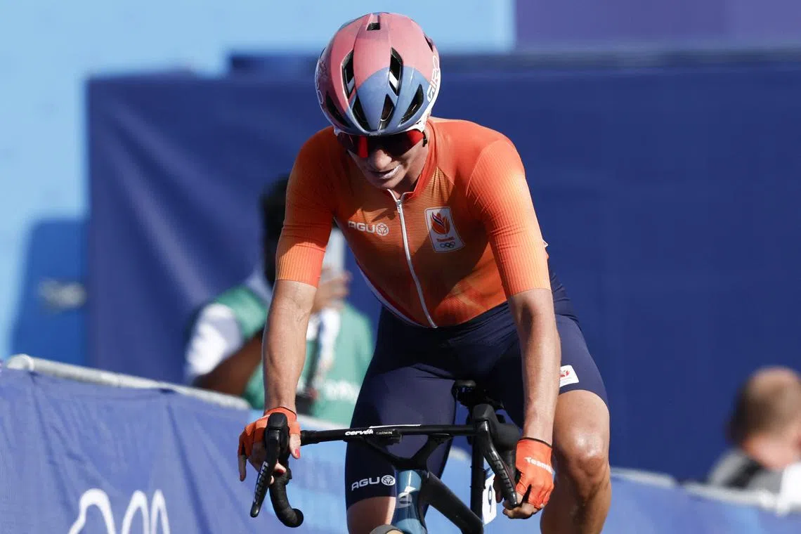 FILE PHOTO: Paris 2024 Olympics - Road Cycling - Women's Road Race - Paris, France - August 04, 2024.  Marianne Vos of Netherlands after crossing the line to win silver REUTERS/Benoit Tessier/File Photo