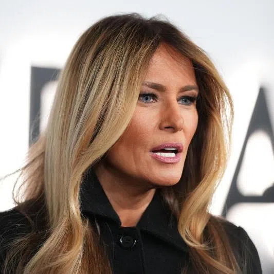 First lady Melania Trump speaking to reporters at the premiere of the new documentary film Melania in Washington. . 