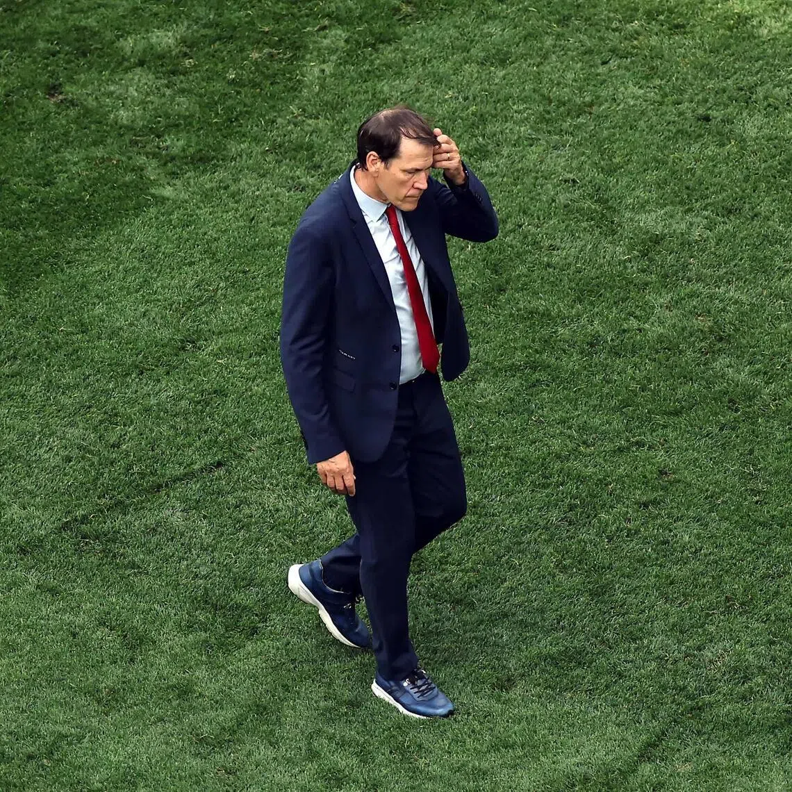 Belgium coach Rudi Garcia reacts after his team’s 1-2 loss to Spain on July 10.