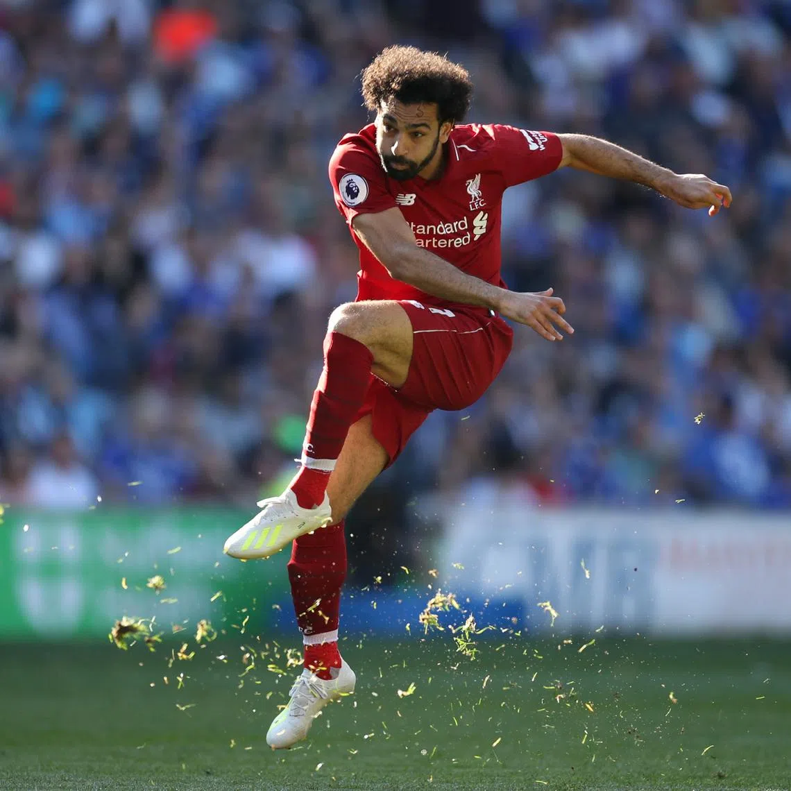 FILE PHOTO: Soccer Football - Premier League - Cardiff City v Liverpool - Cardiff City Stadium, Cardiff, Britain - April 21, 2019   Liverpool's Mohamed Salah shoots at goal   Action Images via Reuters/Carl Recine/File Photo