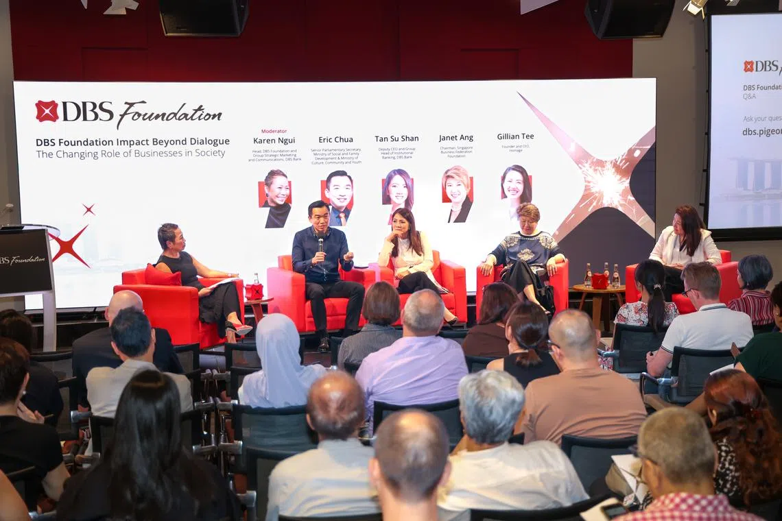 Senior Parliamentary Secretary for Social and Family Development Eric Chua (second from left) speaking at a panel discussion on the changing role of businesses in society on Sept 18.