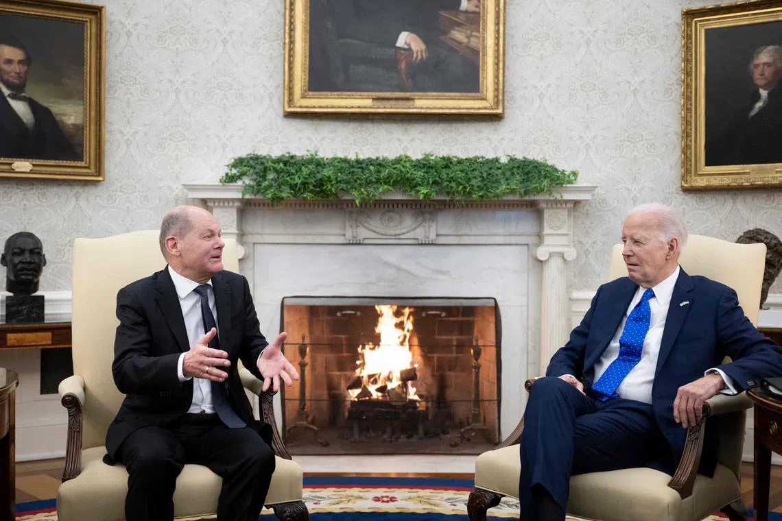 US President Joe Biden (R) meets with German Chancellor Olaf Scholz (L) in the Oval Office of the White House in Washington, DC, Feb 9, 2024. 
