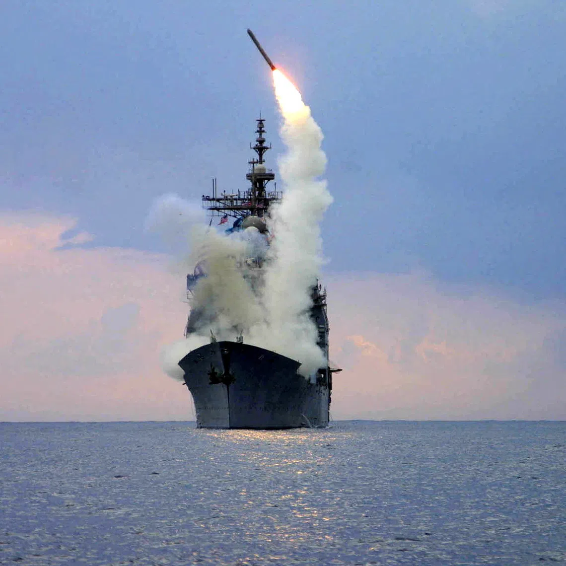 FILE PHOTO: A Tomahawk Land Attack Missile (TLAM) is launched from the guided missile cruiser USS Cape St. George, arch 23, 2003.   REUTERS/U.S. Navy/Intelligence Specialist 1st Class Kenneth Moll/File Photo/File Photo