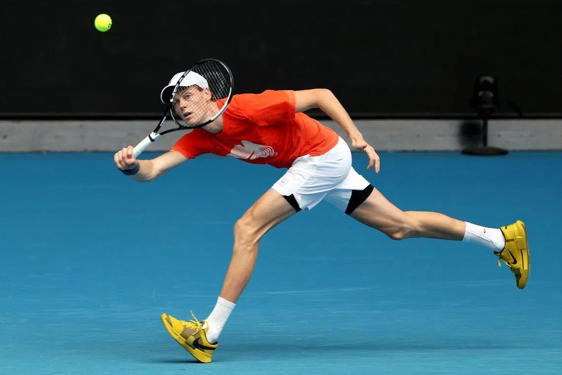 Italy’s Jannik Sinner hits a shot during a practice session in Melbourne on January 15, 2026, ahead of the Australian Open.