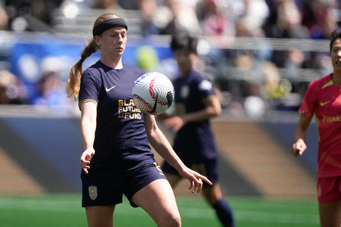 FILE PHOTO: Jun 16, 2024; Seattle, Washington, USA; Seattle Reign FC forward Bethany Balcer (8) controls the ball against Portland Thorns FC during the first half at Lumen Field. Mandatory Credit: Stephen Brashear-USA TODAY Sports/File Photo