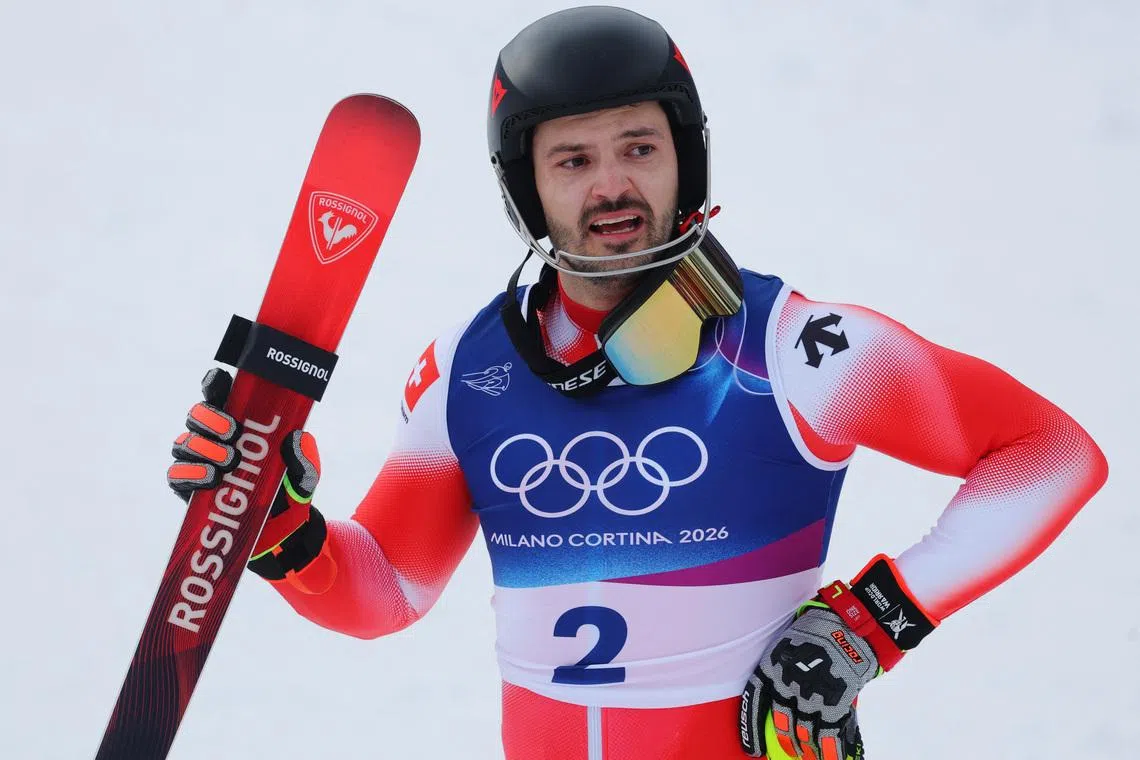 Milano Cortina 2026 Olympics - Alpine Skiing - Men's Slalom Run 2 - Stelvio Ski Centre, Bormio, Italy - February 16, 2026. Gold medallist Loic Meillard of Switzerland celebrates after winning the Men's Slalom REUTERS/Denis Balibouse