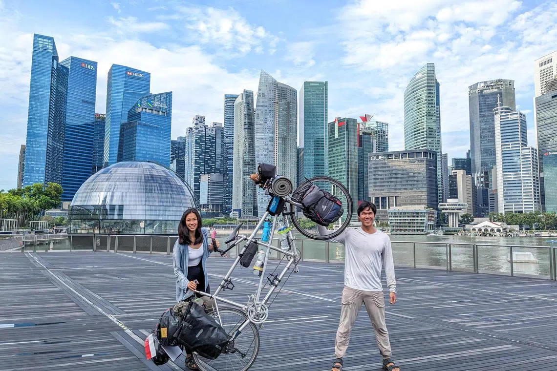 vltandem - Ms Gracia Ng, 26, and Mr Ooi Yee Jia, 28, cycled from the United Kingdom to Singapore on a tandem bike in 2023, arriving in Singapore in time for Christmas. The couple -- who have social media accounts called The Proper Paupers, named for their budget travelling -- are seen here at the Marina Bay Waterfront Promenade in Singapore in late December 2023.



Credit: Gracia Ng and Ooi Yee Jia, The Proper Paupers