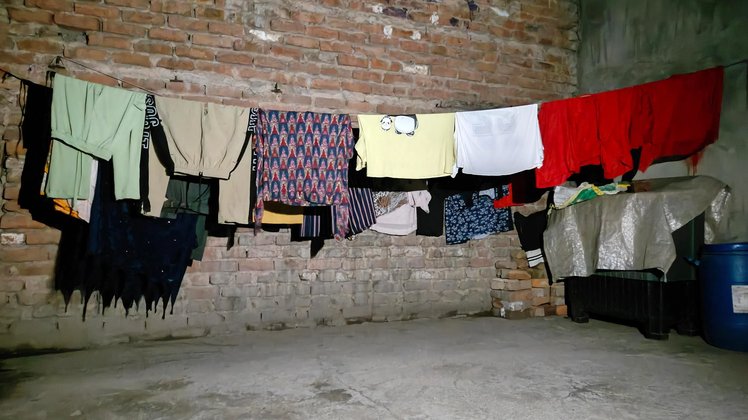 The terrace atop their flat where Durga Devi and her daughters sleep on hot summer nights.