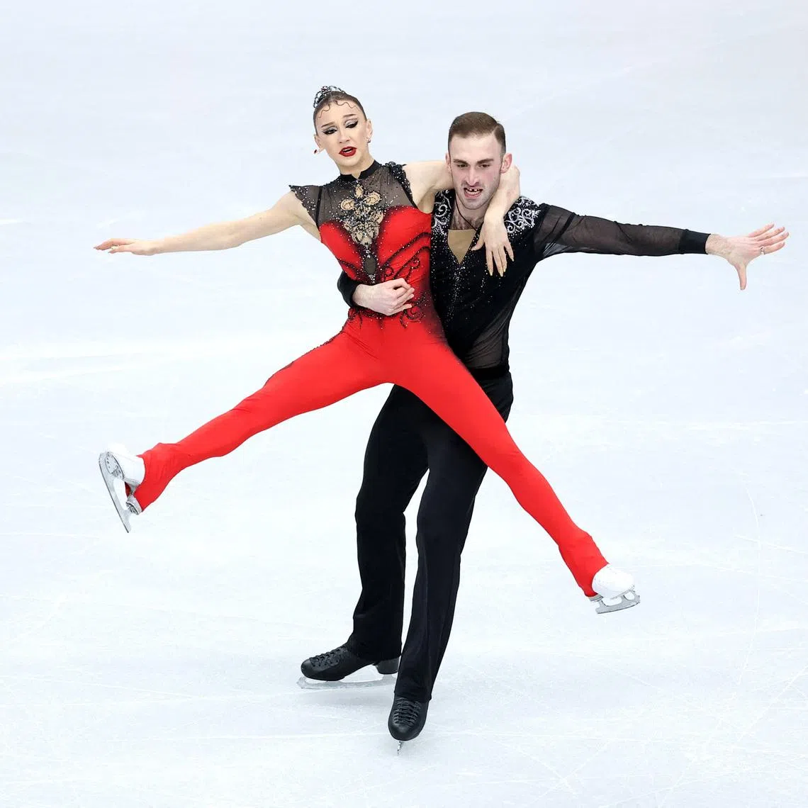 Figure Skating - ISU Figure Skating European Championships - Sheffield Arena, Sheffield, Britain - January 14, 2026 Georgia's Anastasiia Metelkina and Luka Berulava perform during the pairs - short program. Action Images via Reuters/Andrew Boyers