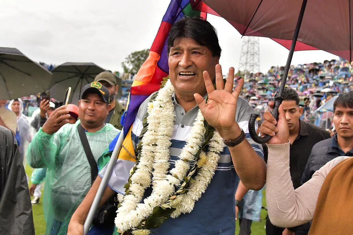 FILE PHOTO: Former Bolivian President Evo Morales waves during an event at which he proclaims himself as a candidate for the presidency in the 2025 elections, in Cochabamba, Bolivia, April 19, 2025. REUTERS/Patricia Pinto/File Photo