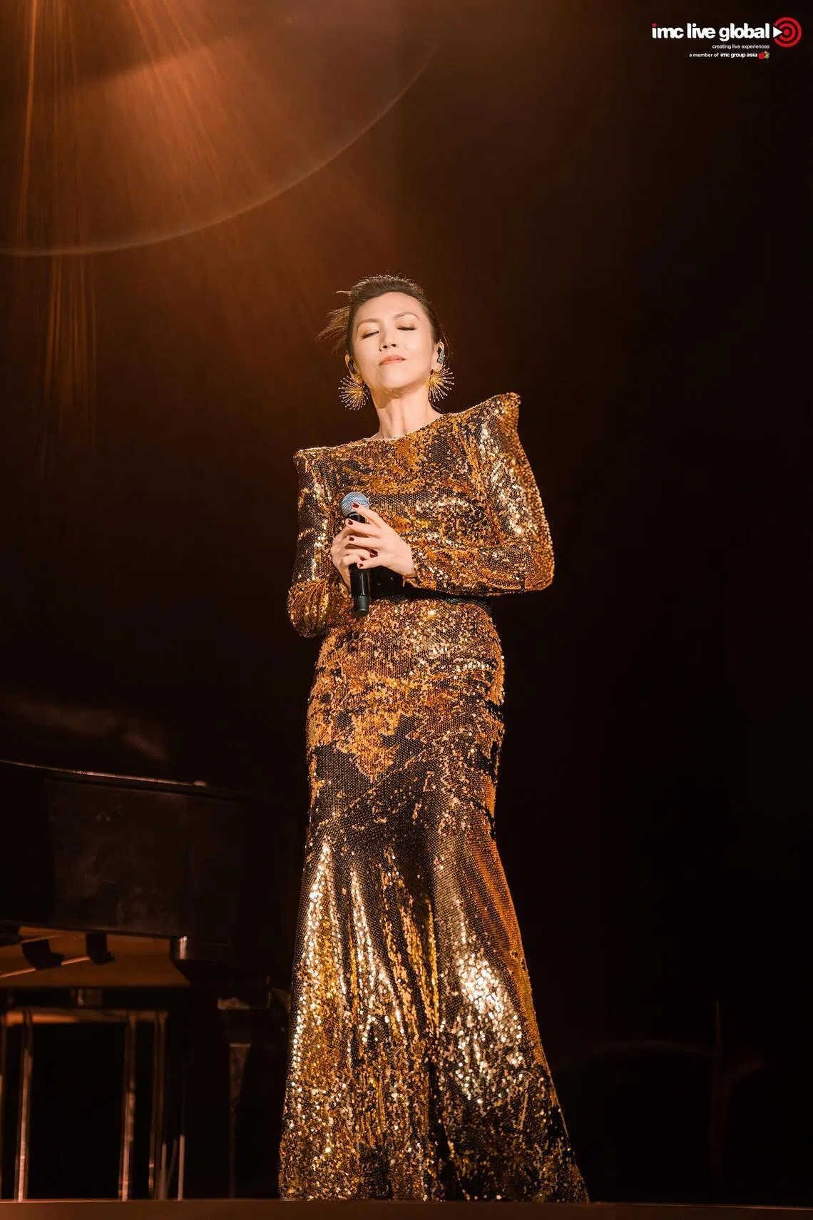 bakit22 - Singaporean singer Kit Chan during a concert in Shanghai on May  30, 2026

PHOTO: IMC LIVE GLOBAL