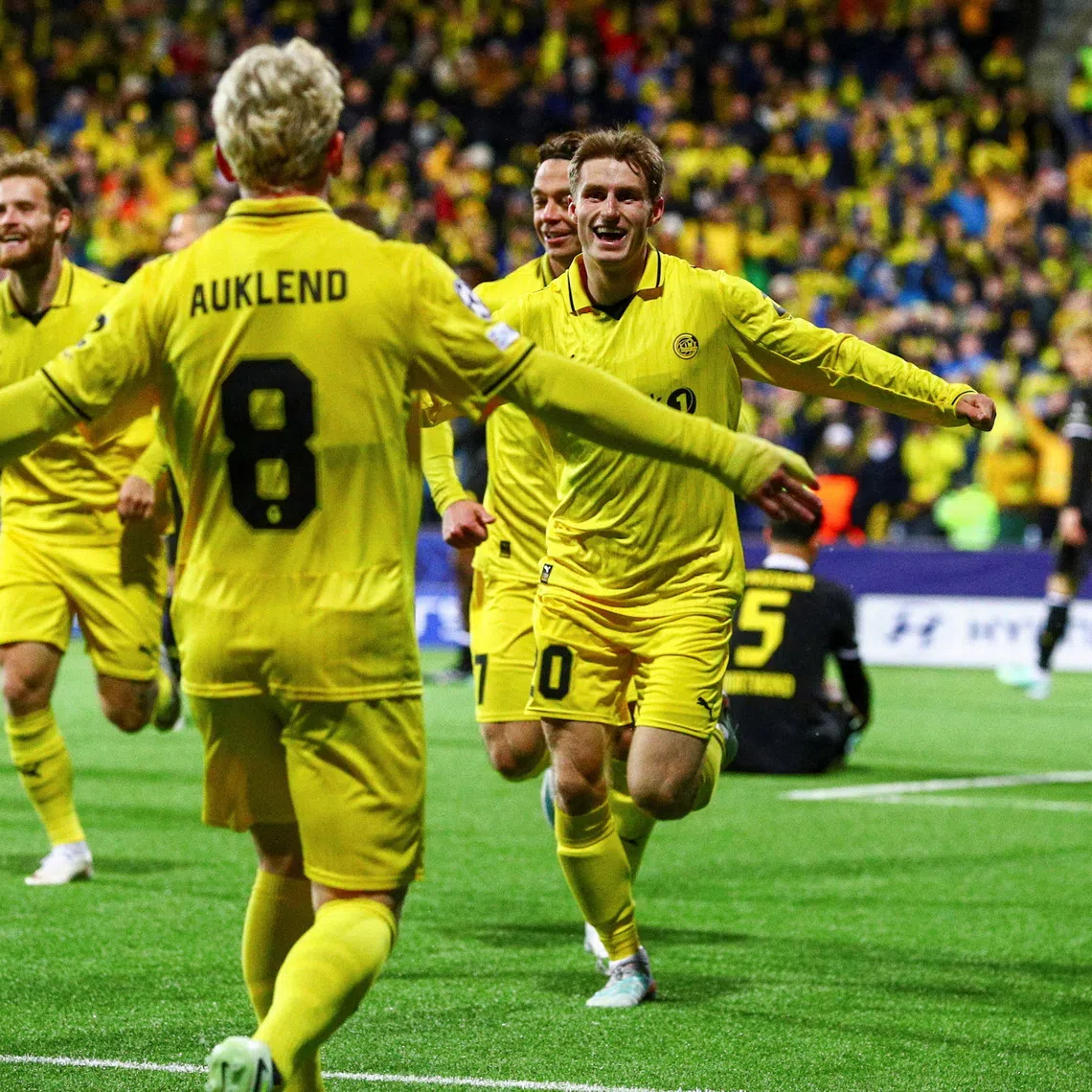 Soccer Football - UEFA Champions League - Bodo/Glimt v Borussia Dortmund - Aspmyra Stadion, Bodo, Norway - October 14, 2026 Bodo/Glimt's Fredrik Sjovold celebrates scoring their first goal with Sondre Auklend Mats Torbergsen/NTB via REUTERS