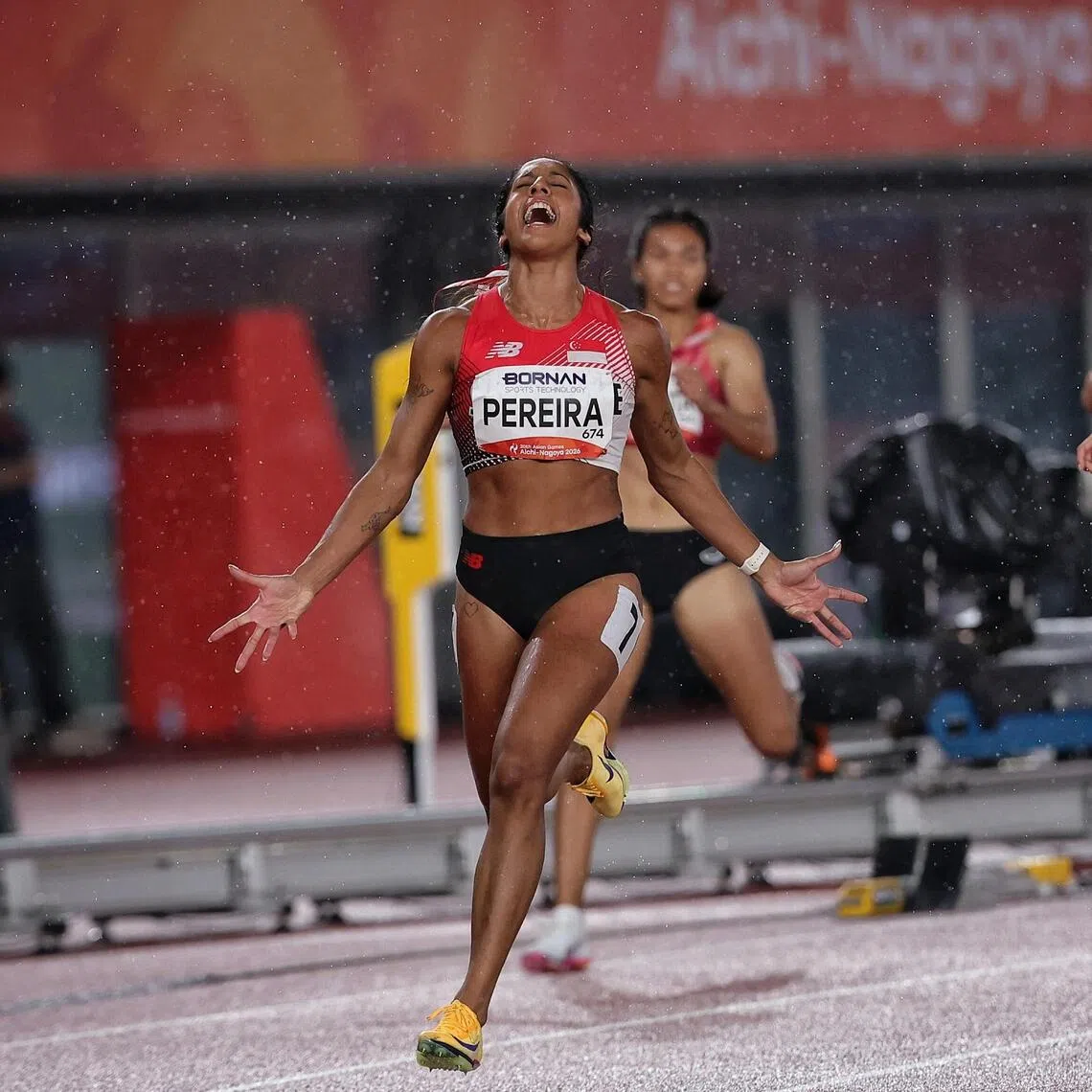 In this memorable photograph of Shanti Pereira at the finish of the 200m, her feet are still in the air and she resembles a winged vehicle about to land.