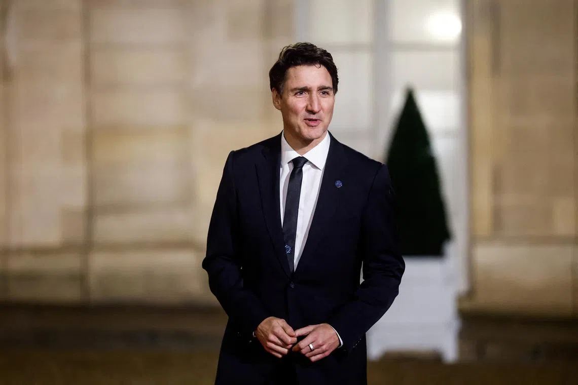 FILE PHOTO: Canadian Prime Minister Justin Trudeau arrives for a meeting with international investors in IA at the Elysee Palace as part of the Artificial Intelligence (AI) Action Summit in Paris, France, February 10, 2025. REUTERS/Gonzalo Fuentes/File Photo