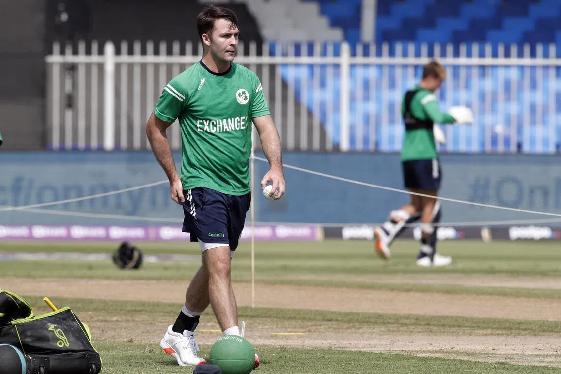 Cricket - ICC Men's T20 World Cup 2021 - Round 1 - Group A - Namibia v Ireland - Sharjah Cricket Stadium, Sharjah, United Arab Emirates - October 22, 2021 Ireland's Curtis Campher during the warm up before the match REUTERS/Hamad I Mohammed/File Photo