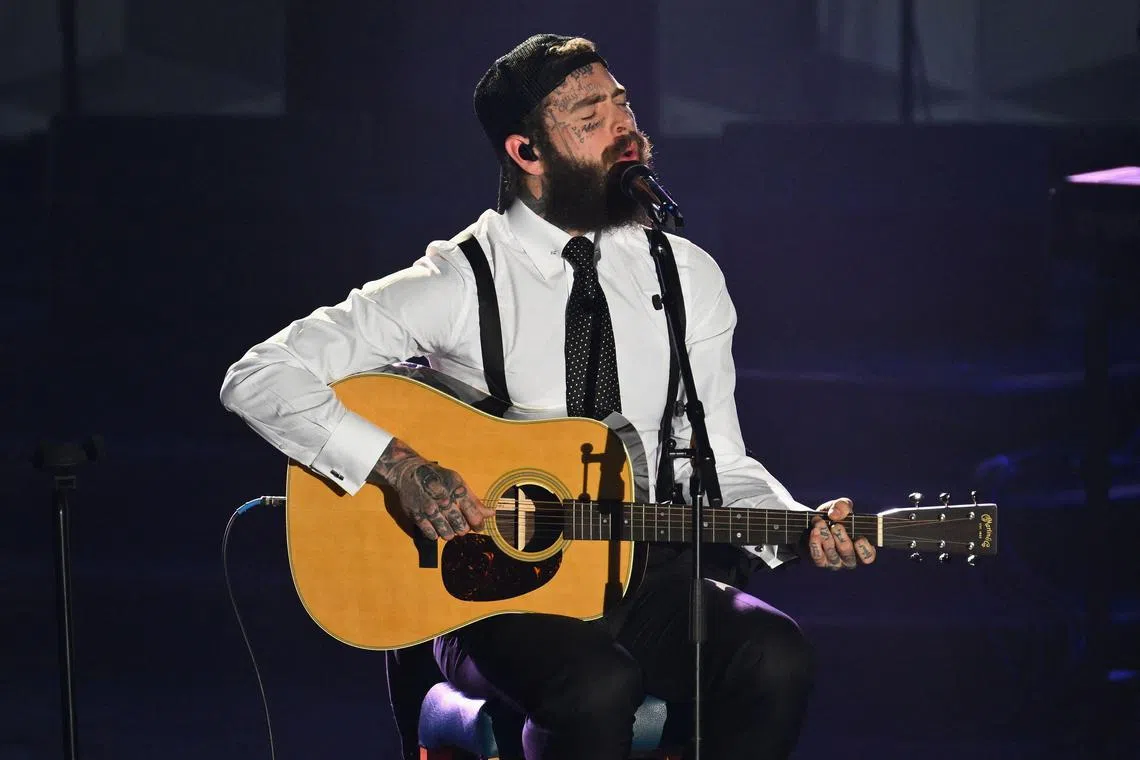 US rapper Post Malone performs onstage during the 52nd Songwriters Hall of Fame Induction and Awards Gala in New York City on June 15, 2023. (Photo by ANGELA WEISS / AFP)
