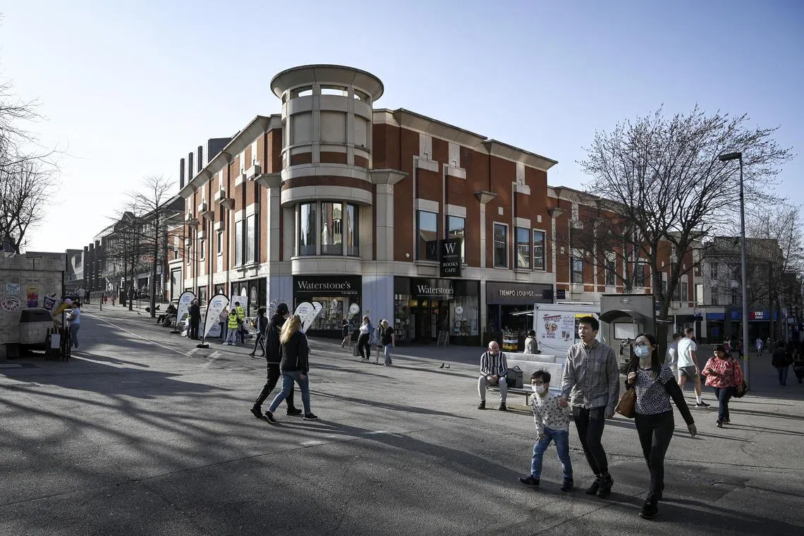 FILE -- Sutton High Street, now home to a number of Hong Kong families, in southwest London, March 26, 2022. Net migration to Britain has exceeded 600,000 a year, new figures show, stirring tensions in a government that has promised both to stem arrivals and to revive a sluggish economy. (Mary Turner/The New York Times)