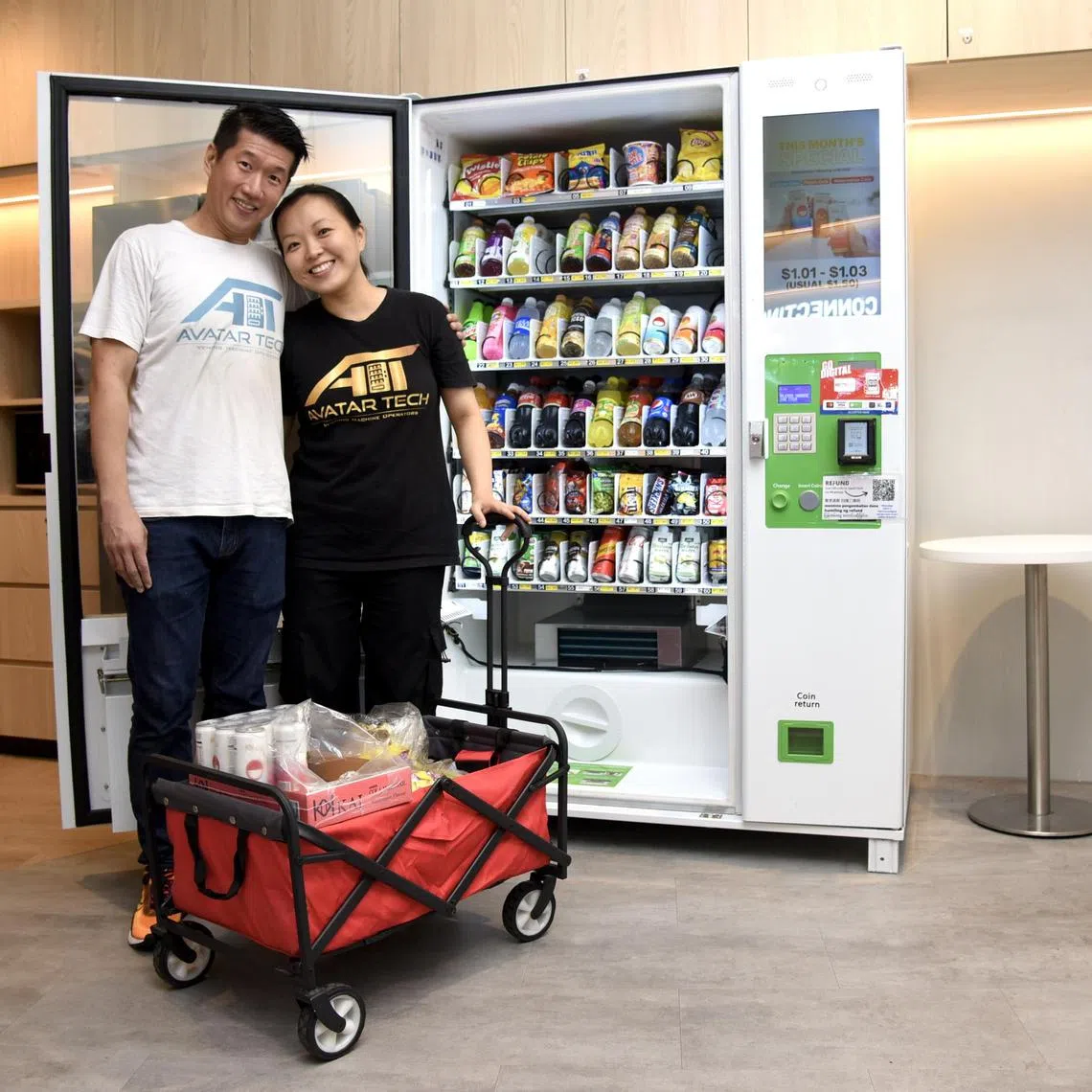 ST20240416_202454806558/ssvending19/Heng Yi-Hsin/Sarah Stanley/

Profile of Vending Machine Business Avatar Tech Founders Grace Tan, 38, and Derek Gue, 42, at the NETS Customer Service Centre on April 16, 2024. 

They rent and sell vending machines to customers, who often are looking for a side hustle to draw extra income. 

ST PHOTO: HENG YI-HSIN