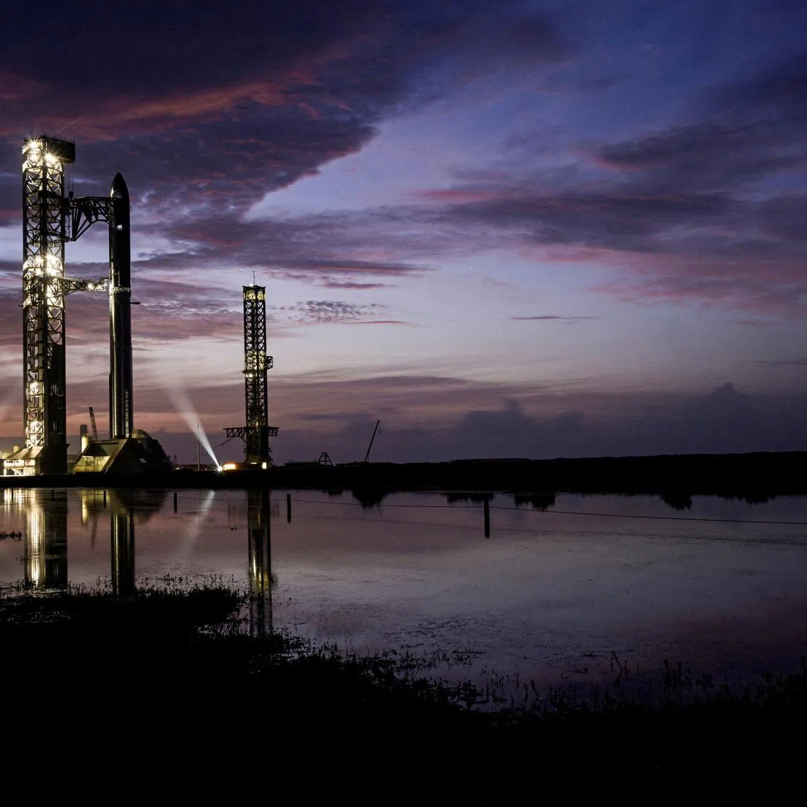 The SpaceX Starship and Super Heavy v3 Booster stand at pad 2 at sunrise before its 13th test flight from the SpaceX launch complex in Starbase, Texas, U.S., July 16, 2026. REUTERS/Steve Nesius     TPX IMAGES OF THE DAY