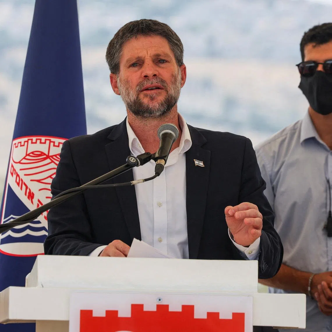 Israeli Finance Minister Bezalel Smotrich speaks at a press conference regarding settlements expansion for the long-frozen E1 settlement, that would split East Jerusalem from the occupied West Bank, near the Israeli settlement of Maale Adumim in the Israeli-occupied West Bank, August 14, 2025. REUTERS/Ronen Zvulun