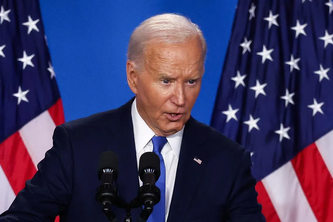 FILE PHOTO: U.S. President Joe Biden speaks at a press conference during NATO's 75th anniversary summit, in Washington, U.S., July 11, 2024. REUTERS/Yves Herman/File Photo
