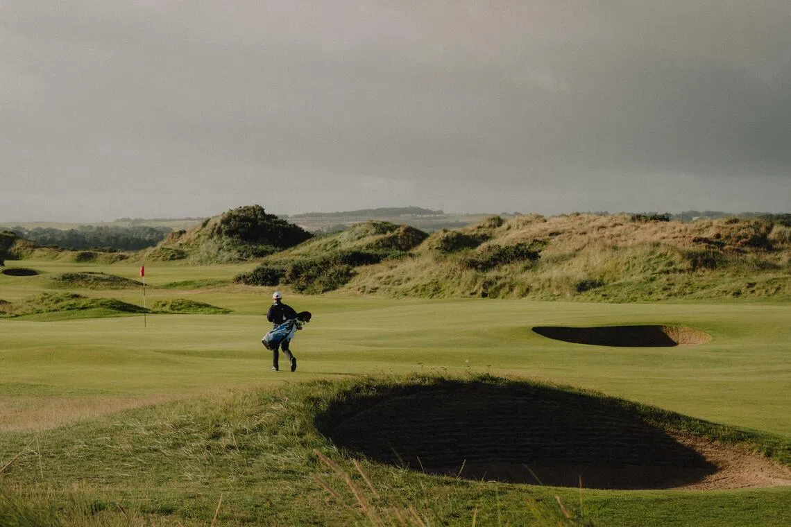 A golfer in St Andrews, Scotland, in Sept 2026.