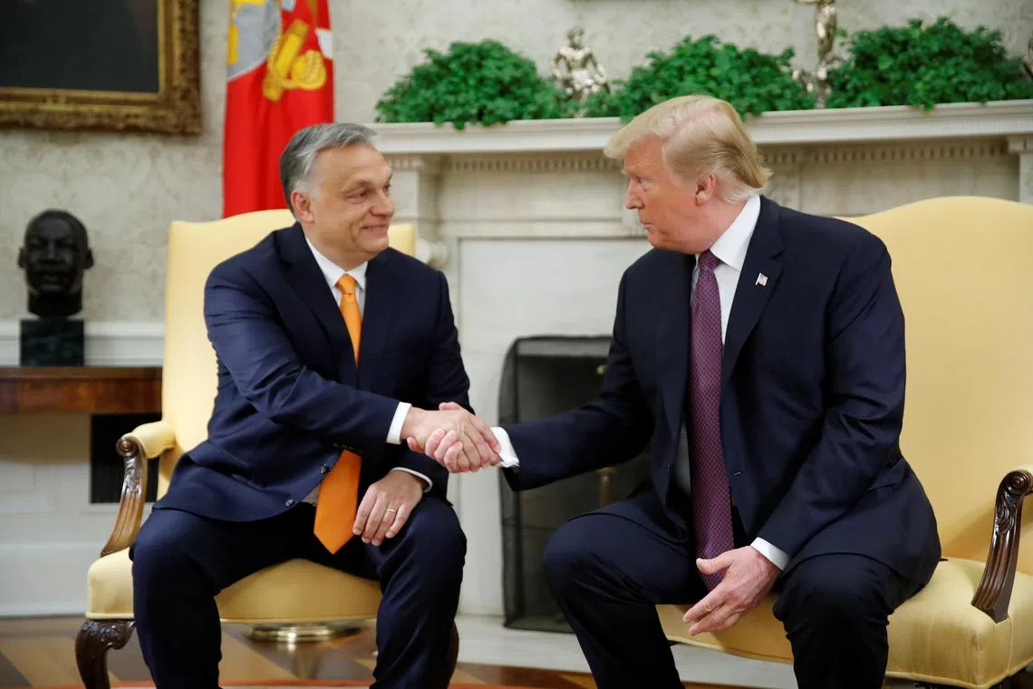 U.S. President Donald Trump greets Hungary's Prime Minister Viktor Orban in the Oval Office at the White House in Washington, U.S., May 13, 2019. REUTERS/Carlos Barria/ File Photo