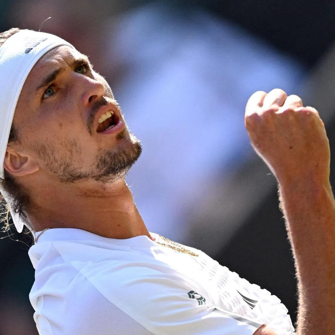 Germany's Alexander Zverev reacts as he plays against US player Taylor Fritz during their men's singles quarter-final tennis match on the tenth day of the 2026 Wimbledon Championships at The All England Lawn Tennis and Croquet Club in Wimbledon, southwest London, on July 8, 2026. (Photo by Kirill KUDRYAVTSEV / AFP) / RESTRICTED TO EDITORIAL USE