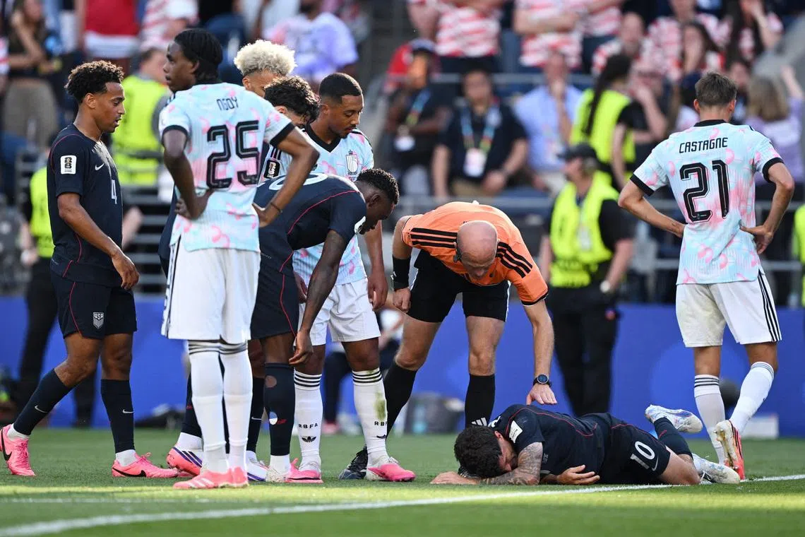 Soccer Football - FIFA World Cup 2026 - Round of 16 - United States v Belgium - Seattle Stadium, Seattle, Washington, U.S. - July 6, 2026 Christian Pulisic of the U.S. reacts after sustaining an injury IMAGN IMAGES via Reuters/Troy Wayrynen/File Photo