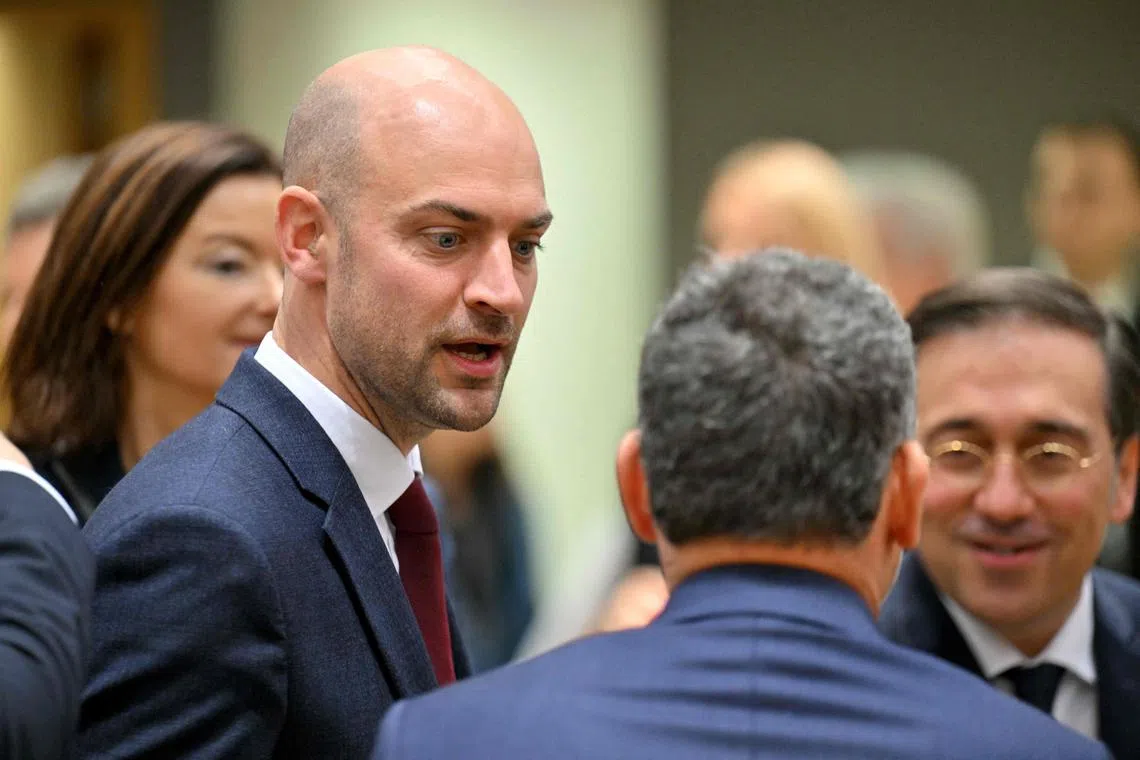 Foreign Minister Jean-Noel Barrot (left) says France has evidence that Russia is trying to manipulate influencers in European countries.