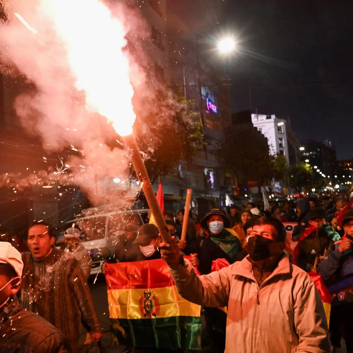 Demonstrators take part in a march, which organizers have dubbed a \"defense of democracy,\" to rally against road blockades and what they call pressure measures used by protesters calling for the resignation of Bolivia’s President Rodrigo Paz, amid the country’s economic and fuel crisis, in La Paz, Bolivia, May 20, 2026. REUTERS/Claudia Morales