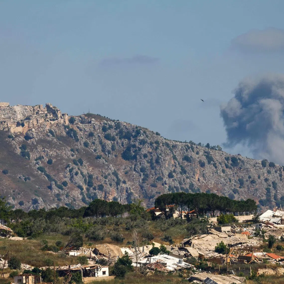 Smoke rises following Israeli bombardment in southern Lebanon close to the Beaufort Castle, as seen from a position across the border in the Upper Galilee in northern Israel on June 19.