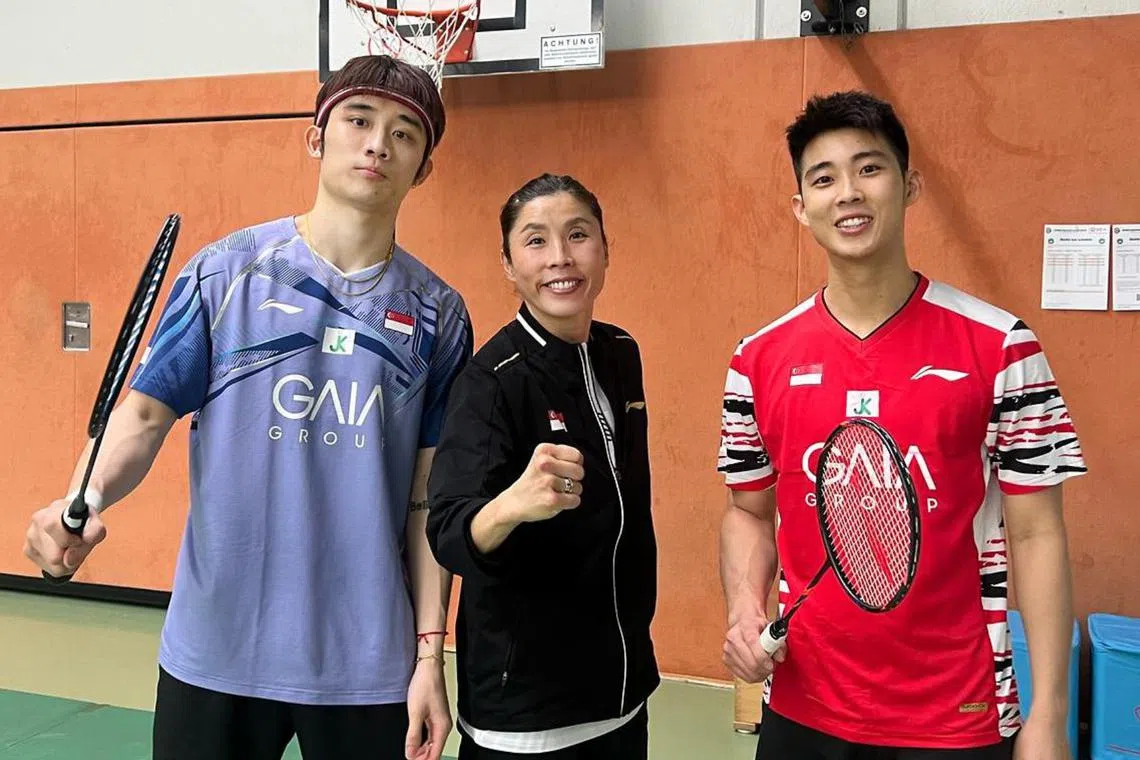 National singles head coach Kim Ji-hyun and men's singles players Jason Teh (left) and Loh Kean Yew before their German Open quarter-final on Feb 28.