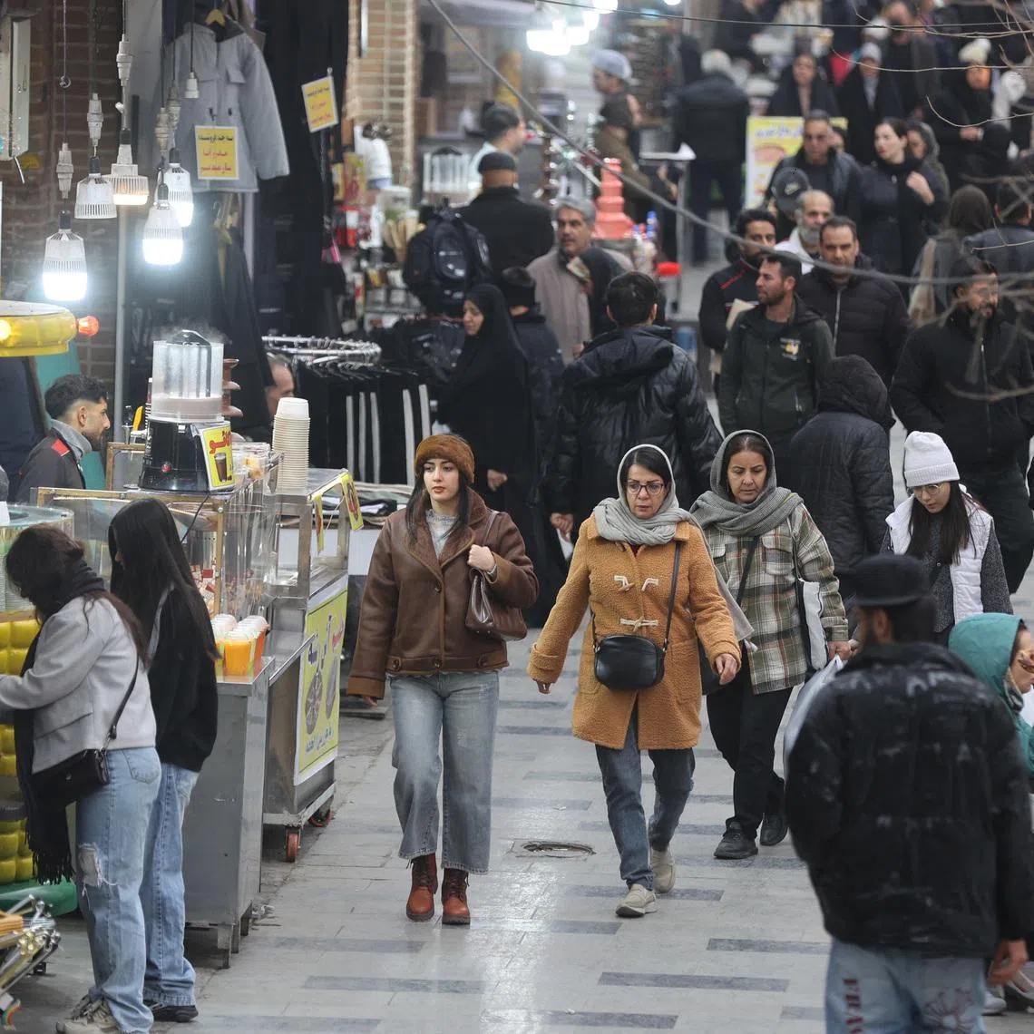 People walk in Tehran Grand Bazaar in Tehran, Iran, January 15, 2026. Majid Asgaripour/WANA (West Asia News Agency) via REUTERS