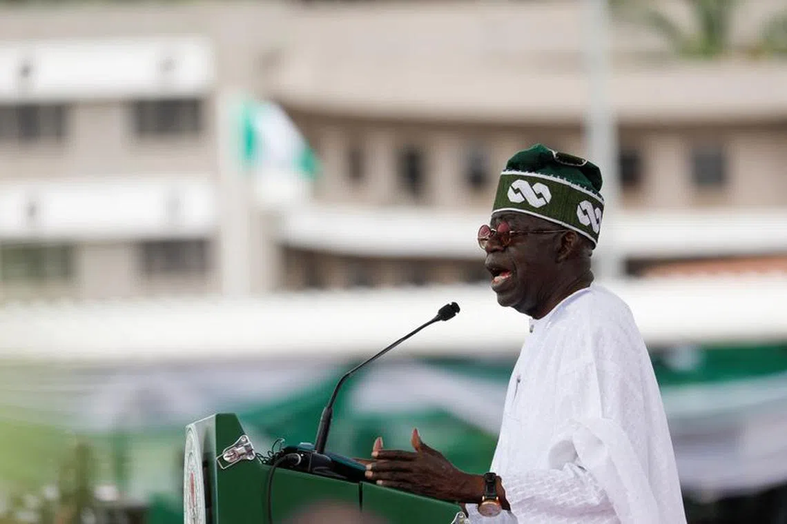 FILE PHOTO: Nigeria's President Bola Tinubu speaks after his swearing-in ceremony in Abuja, Nigeria May 29, 2023. REUTERS/Temilade Adelaja