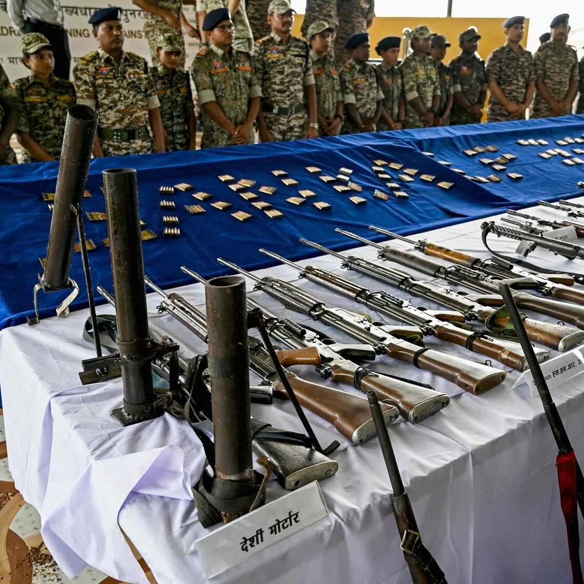 Indian police display large caches of arms and ammunition seized from Maoist rebels on March 31, 2026.
