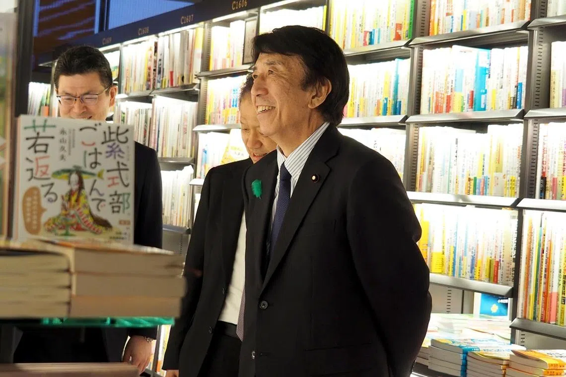 Mr Ken Saito, Minister of Economy, Trade and Industry, visits Ogaki Bookstore at Azabudai Hills in Tokyo for a dialogue with bookstore industry stakeholders on April 16, 2024.